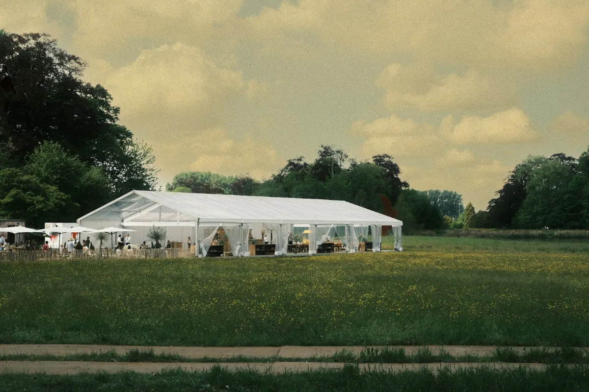 A white marquee in a green field
